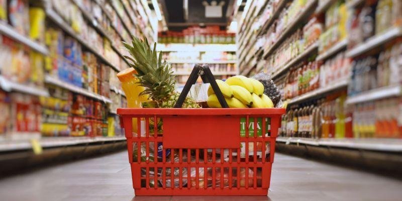 Person using Google Maps on a smartphone to navigate to the closest grocery store in 202